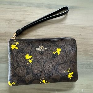 Coach wristlet featuring Peanuts Woodstock nwot